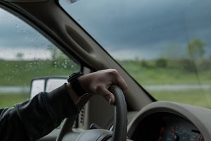 Steering wheel with person driving